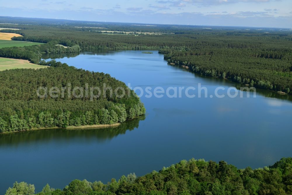 Karnzow from above - Riparian areas on the lake area of Obersee in a forest area in the district Drewen in Karnzow in the state Brandenburg, Germany