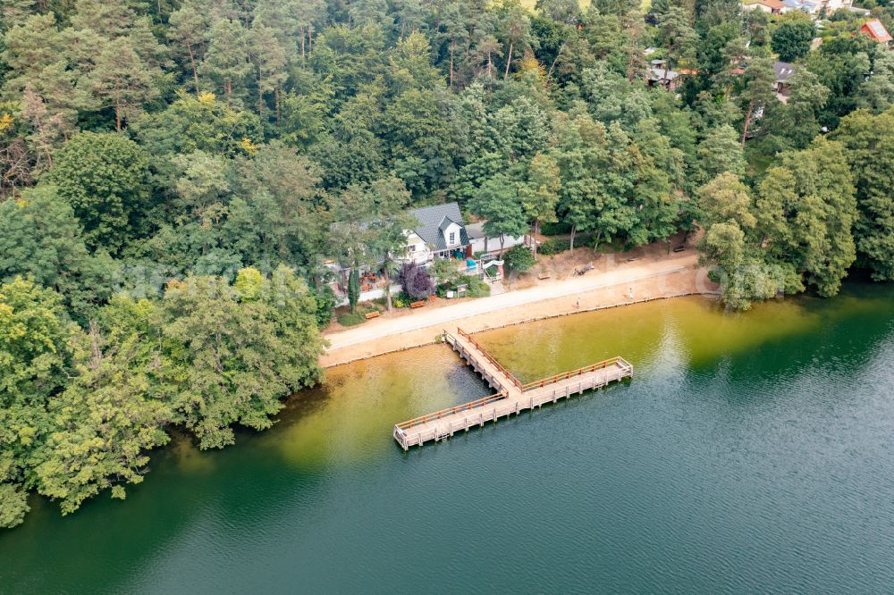 Lanke from the bird's eye view: Riparian areas on the lake area of Obersee in Lanke in the state Brandenburg, Germany