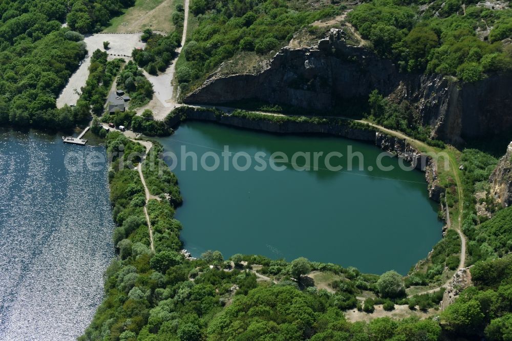 Allinge from the bird's eye view: Shore areas of the lake Opalsee - Opalsoen in a disused quarry on the island of Bornholm in Allinge Region Hovedstaden, Denmark