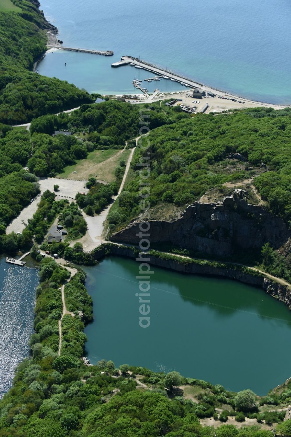 Aerial image Allinge - Shore areas of the lake Opalsee - Opalsoen in a disused quarry on the island of Bornholm in Allinge Region Hovedstaden, Denmark