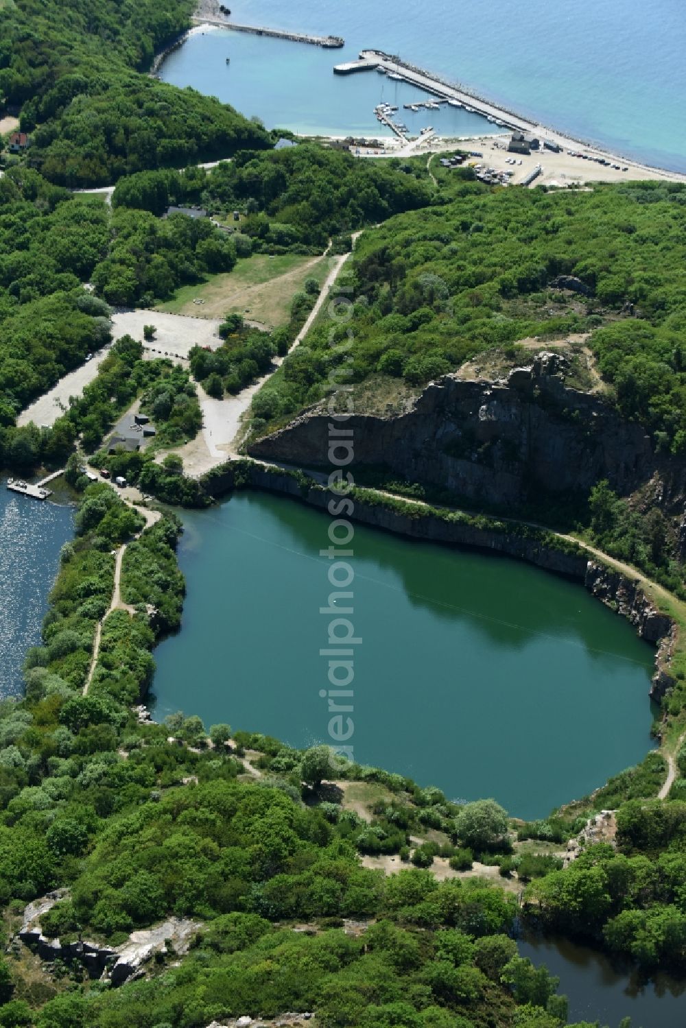 Aerial photograph Allinge - Shore areas of the lake Opalsee - Opalsoen in a disused quarry on the island of Bornholm in Allinge Region Hovedstaden, Denmark