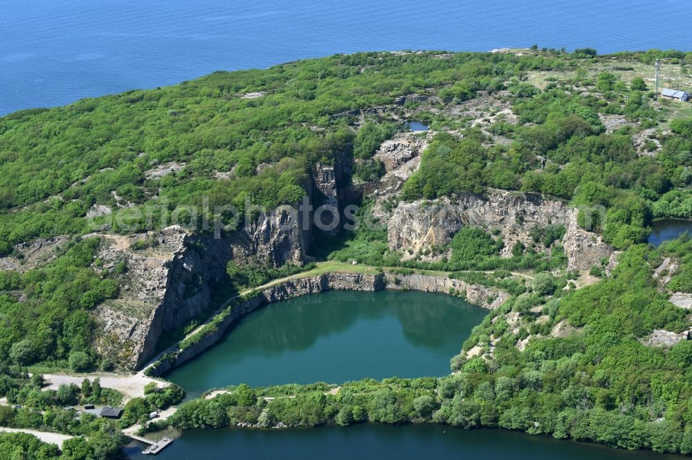 Allinge from the bird's eye view: Shore areas of the lake Opalsee - Opalsoen in a disused quarry on the island of Bornholm in Allinge Region Hovedstaden, Denmark