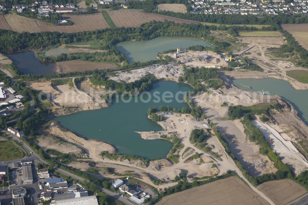 Neuwied from above - Riparian areas on the lake area of Steinsee in Neuwied in the state Rhineland-Palatinate, Germany. The former excavation lake belongs to a drinking water protection area and serves the Angelsportverein (Fishing Sport Club) Neuwied for sport fishing