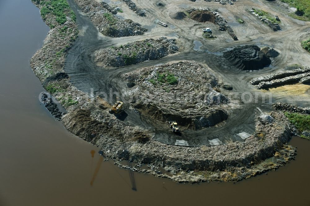 Böhlen from the bird's eye view: Riparian areas on the lake area of Wapplersee with rubble embankments and landfills in Boehlen in the state Saxony