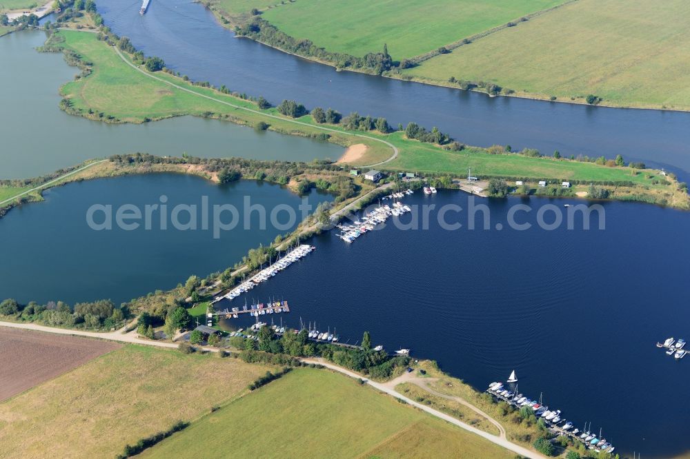 Weyhe from above - Riparian areas on the lake area of Wieltsee with piers and intake to the river Weser in Weyhe in the state Lower Saxony