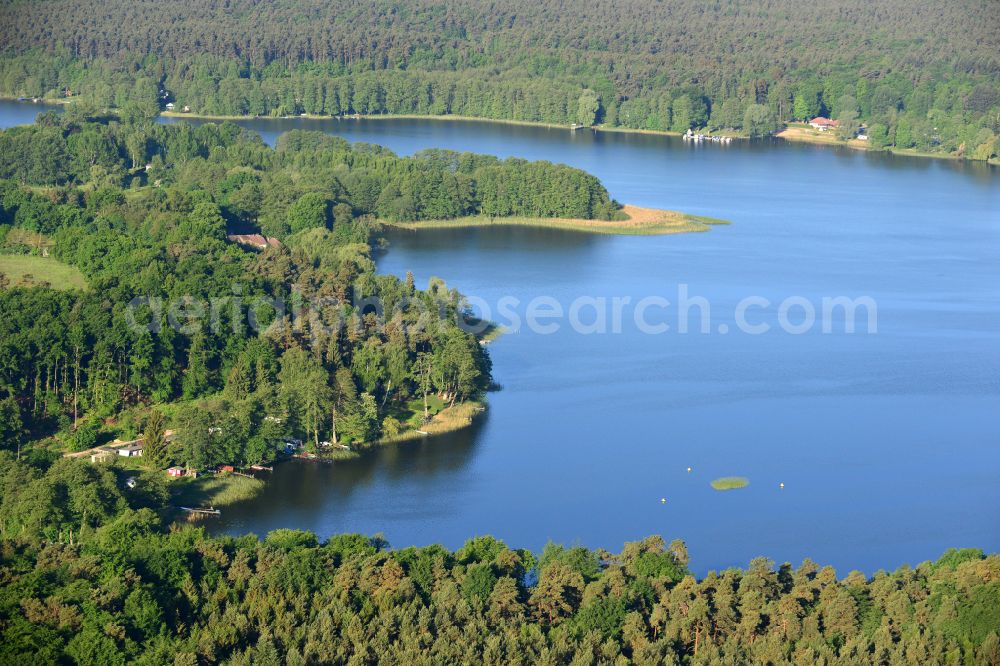 Aerial image Krangen - Riparian areas on the lake area of Zermuetzelsee in a forest area in Krangen in the state Brandenburg, Germany