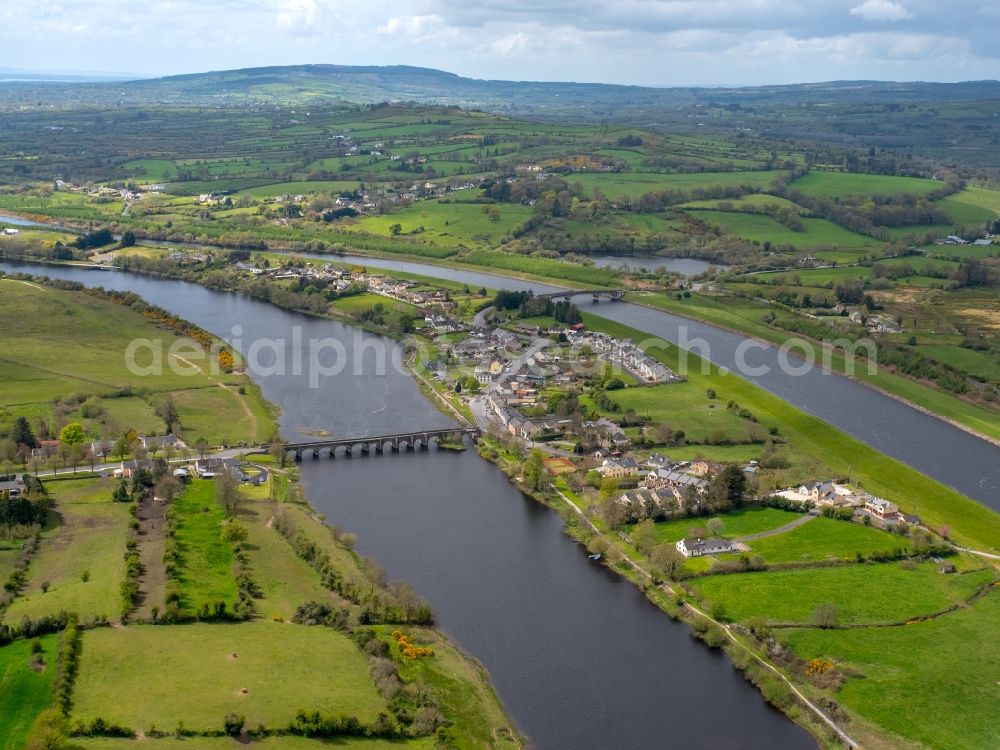 Aerial image Parteen Weir - Curved loop of the riparian zones on the course of the river Shannon in Parteen Weir in Clare, Ireland