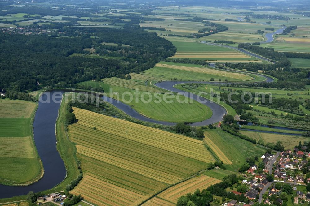 Münsterdorf from above - Curved loop of the riparian zones on the course of the river Stoer in Muensterdorf in the state Schleswig-Holstein