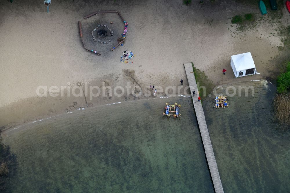 Mönchwinkel from the bird's eye view: Riparian areas on the lake area of Stoeritzsee in Moenchwinkel in the state Brandenburg, Germany