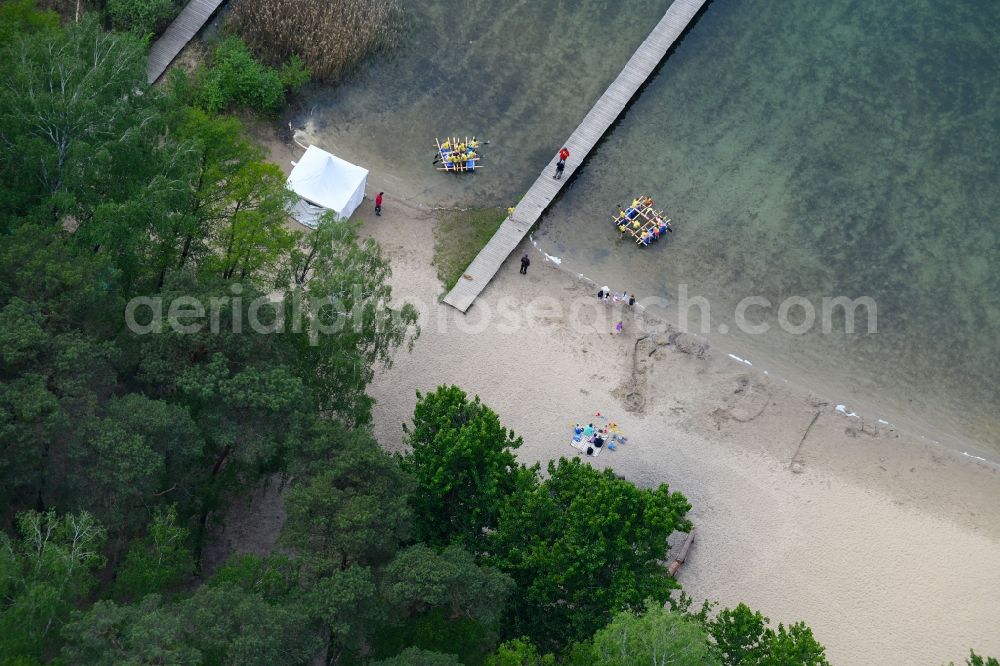 Aerial image Mönchwinkel - Riparian areas on the lake area of Stoeritzsee in Moenchwinkel in the state Brandenburg, Germany