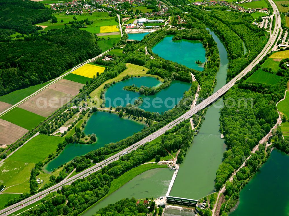 Altenstadt from the bird's eye view: Shore areas of the ponds for fish farming in Altenstadt in the state Bavaria, Germany