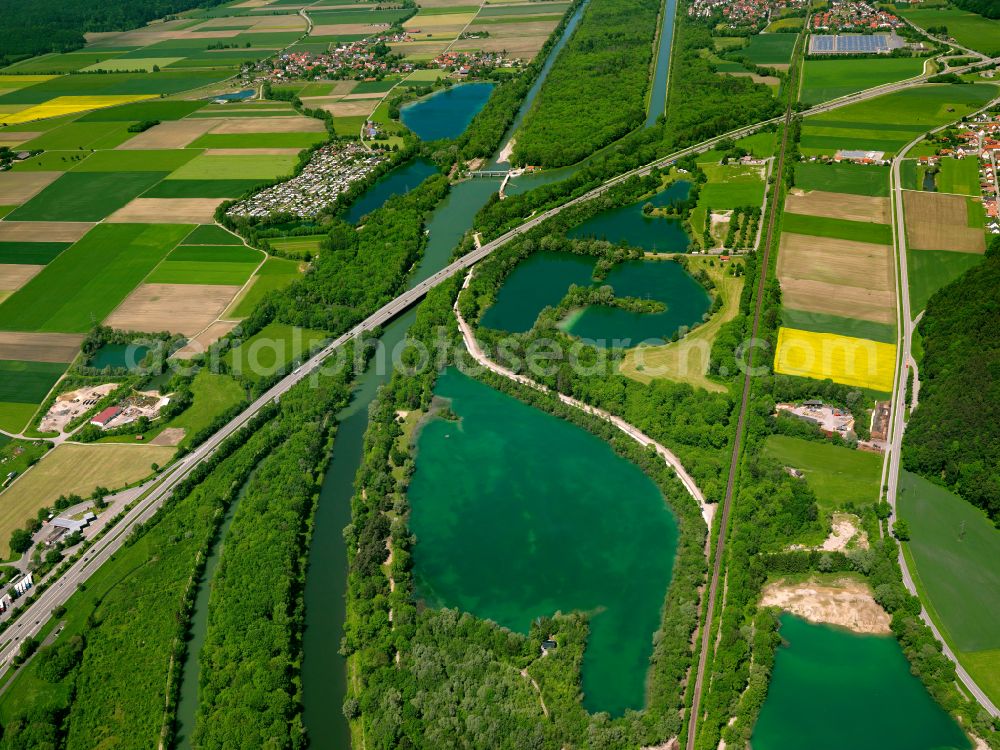 Altenstadt from the bird's eye view: Shore areas of the ponds for fish farming in Altenstadt in the state Bavaria, Germany