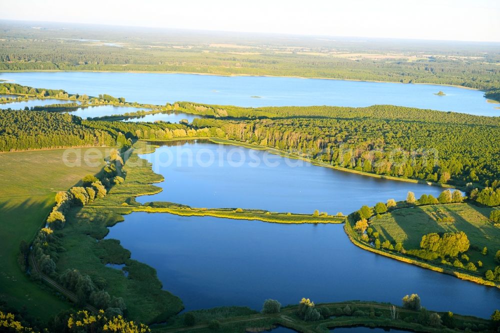 Aerial image Boecker Mühle - Shore areas of the ponds for fish farming Caarpsee - Woterfitzsee in Boecker Muehle in the state Mecklenburg - Western Pomerania, Germany