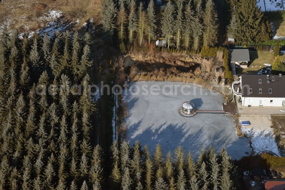 Bernau from above - Shore ice areas of the ponds for fish farming on Edelweissstrasse in Bernau in the state Brandenburg