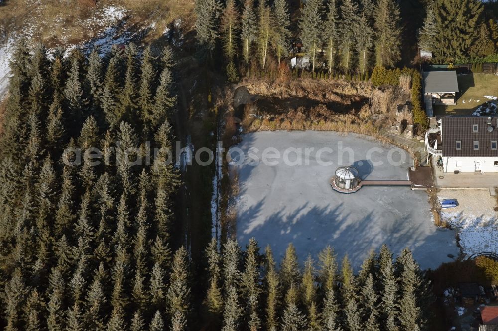 Bernau from the bird's eye view: Shore ice areas of the ponds for fish farming on Edelweissstrasse in Bernau in the state Brandenburg