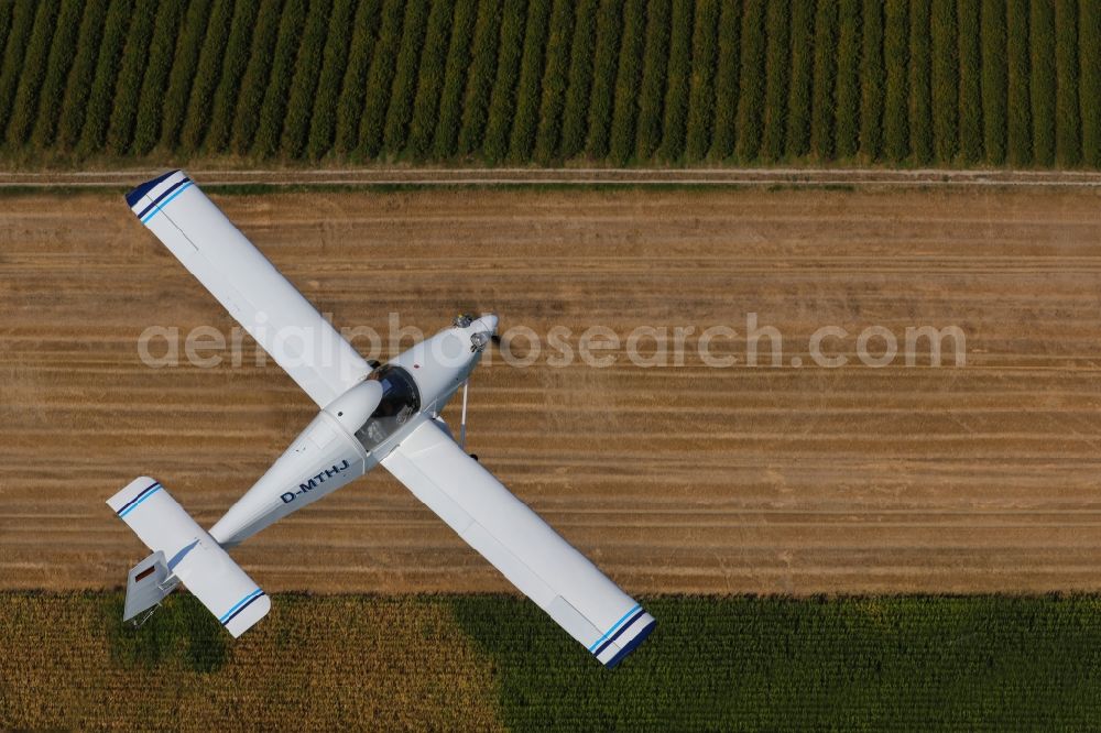 Freiburg im Breisgau from above - Ultralight aircraft of the 120 kilos LSA class Colomban MC-30 Luciole in flight over the airspace in Freiburg in the Breisgau in the state of Baden-Wuerttemberg