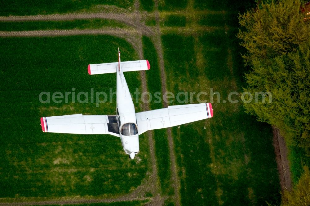 Aerial image Hamm - Ultralight aircraft in flight above a field in Hamm in the state North Rhine-Westphalia