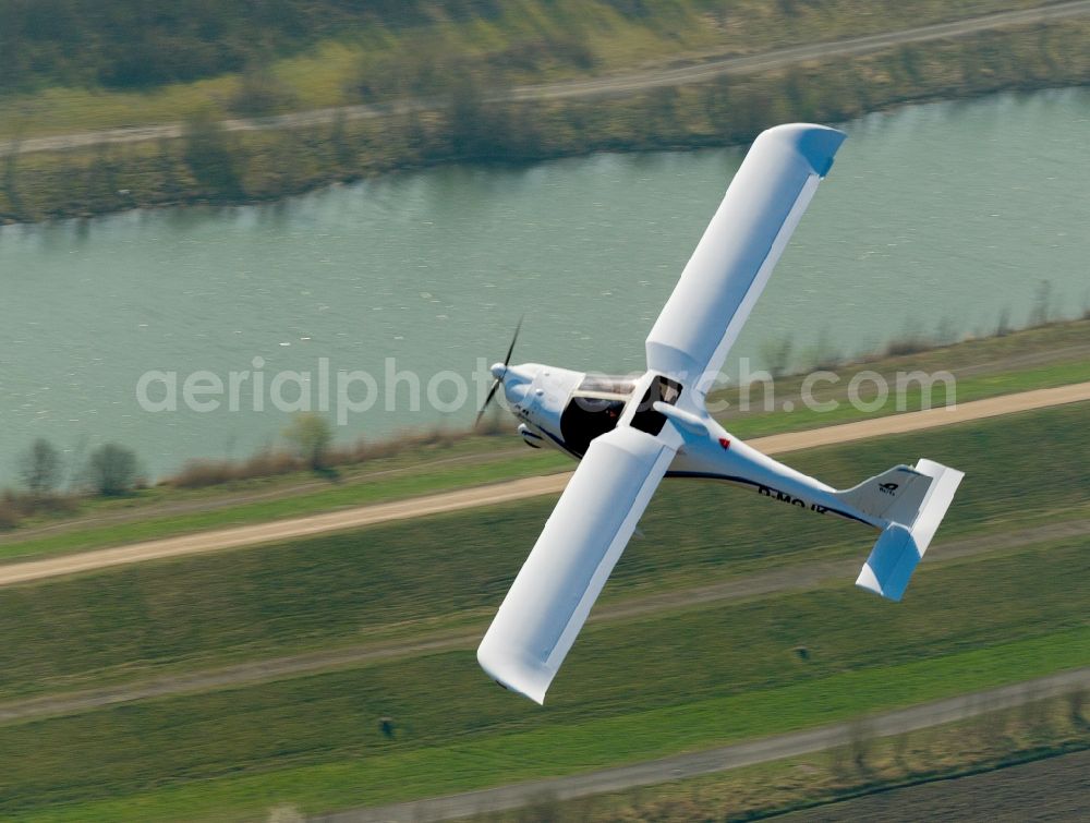 Aerial photograph Hamm - View of an ultralight aircraft, a JK 05 Junior with the registration D-MQJK after starting on the airfield Hamm in North Rhine-Westphalia