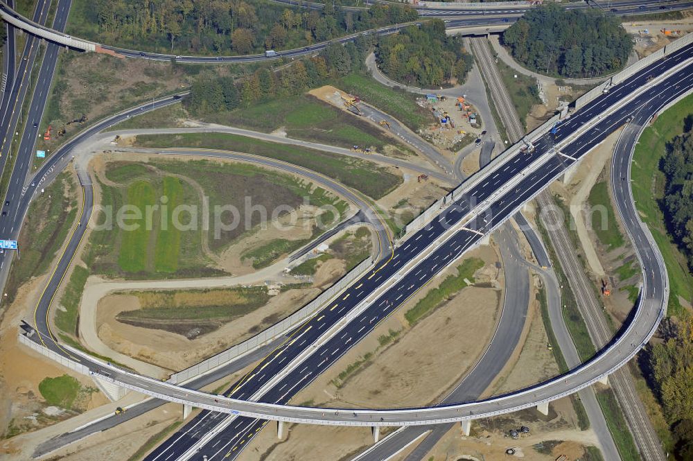 Aerial photograph BRAUNSCHWEIG - Blick auf den Um- und Ausbau des Autobahndreiecks Braunschweig-Südwest an der Autobahn A39 / A 391. Der EUROVIA Baukonzern errichtet hier einige Brückenneubauten. Bauherr ist die Niedersächsische Landesbehörde für Straßenbau und Verkehr. View of the implementation and expansion of the motorway junction Braunschweig-southwest along the highway A39 / A 395th The construction company built EUROVIA here are some new bridges. Owner is the Lower Saxony state authorities for road construction and transport.