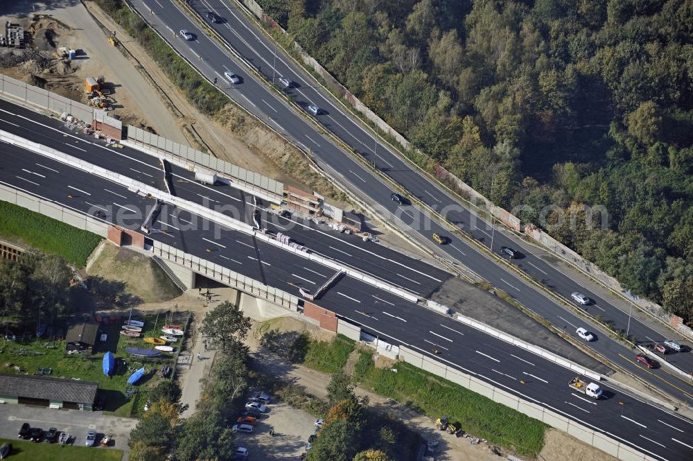 Aerial photograph BRAUNSCHWEIG - Blick auf den Um- und Ausbau des Autobahndreiecks Braunschweig-Südwest an der Autobahn A39 / A 391. Der EUROVIA Baukonzern errichtet hier einige Brückenneubauten. Bauherr ist die Niedersächsische Landesbehörde für Straßenbau und Verkehr. View of the implementation and expansion of the motorway junction Braunschweig-southwest along the highway A39 / A 395th The construction company built EUROVIA here are some new bridges. Owner is the Lower Saxony state authorities for road construction and transport.