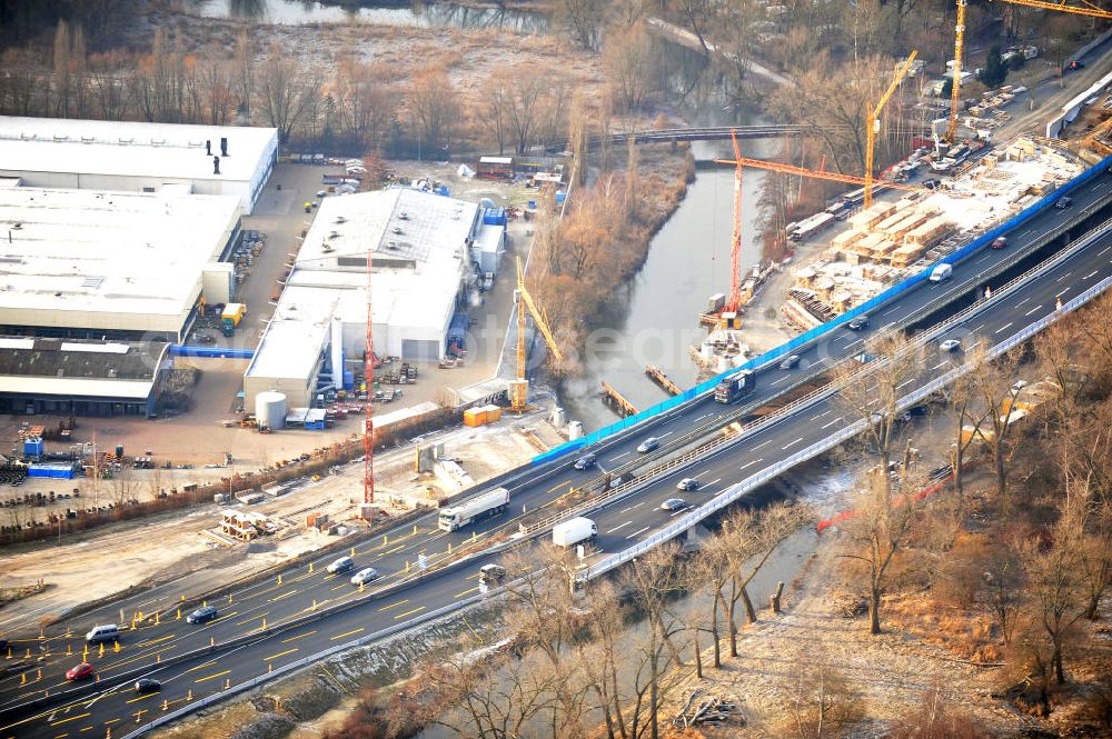 Aerial photograph Braunschweig - Blick auf den Um- und Ausbau des Autobahndreiecks Braunschweig-Südwest an der Autobahn A29 / A 391. Der EUROVIA Baukonzern errichtet hier einige Brückenneubauten. Bauherr ist die Niedersächsische Landesbehörde für Straßenbau und Verkehr. View of the implementation and expansion of the motorway junction Braunschweig-southwest along the highway A29 / A 395th The construction company built EUROVIA here are some new bridges. Owner is the Lower Saxony state authorities for road construction and transport.