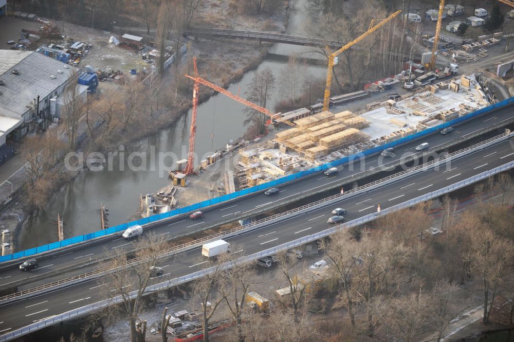 Aerial photograph Braunschweig - Blick auf den Um- und Ausbau des Autobahndreiecks Braunschweig-Südwest an der Autobahn A29 / A 391. Der EUROVIA Baukonzern errichtet hier einige Brückenneubauten. Bauherr ist die Niedersächsische Landesbehörde für Straßenbau und Verkehr. View of the implementation and expansion of the motorway junction Braunschweig-southwest along the highway A29 / A 395th The construction company built EUROVIA here are some new bridges. Owner is the Lower Saxony state authorities for road construction and transport.