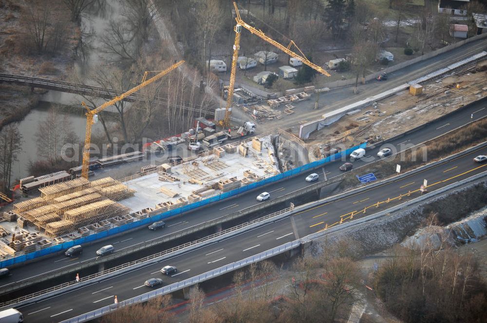 Braunschweig from the bird's eye view: Blick auf den Um- und Ausbau des Autobahndreiecks Braunschweig-Südwest an der Autobahn A29 / A 391. Der EUROVIA Baukonzern errichtet hier einige Brückenneubauten. Bauherr ist die Niedersächsische Landesbehörde für Straßenbau und Verkehr. View of the implementation and expansion of the motorway junction Braunschweig-southwest along the highway A29 / A 395th The construction company built EUROVIA here are some new bridges. Owner is the Lower Saxony state authorities for road construction and transport.