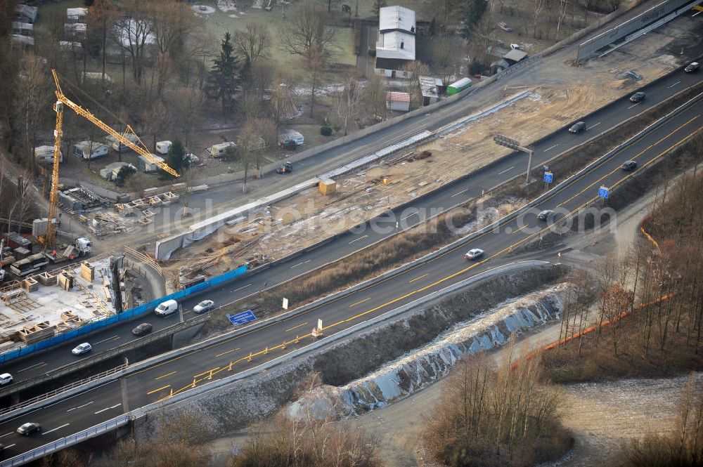 Aerial image Braunschweig - Blick auf den Um- und Ausbau des Autobahndreiecks Braunschweig-Südwest an der Autobahn A29 / A 391. Der EUROVIA Baukonzern errichtet hier einige Brückenneubauten. Bauherr ist die Niedersächsische Landesbehörde für Straßenbau und Verkehr. View of the implementation and expansion of the motorway junction Braunschweig-southwest along the highway A29 / A 395th The construction company built EUROVIA here are some new bridges. Owner is the Lower Saxony state authorities for road construction and transport.