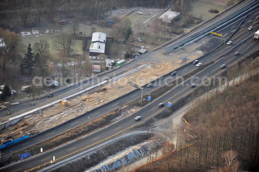 Aerial photograph Braunschweig - Blick auf den Um- und Ausbau des Autobahndreiecks Braunschweig-Südwest an der Autobahn A29 / A 391. Der EUROVIA Baukonzern errichtet hier einige Brückenneubauten. Bauherr ist die Niedersächsische Landesbehörde für Straßenbau und Verkehr. View of the implementation and expansion of the motorway junction Braunschweig-southwest along the highway A29 / A 395th The construction company built EUROVIA here are some new bridges. Owner is the Lower Saxony state authorities for road construction and transport.