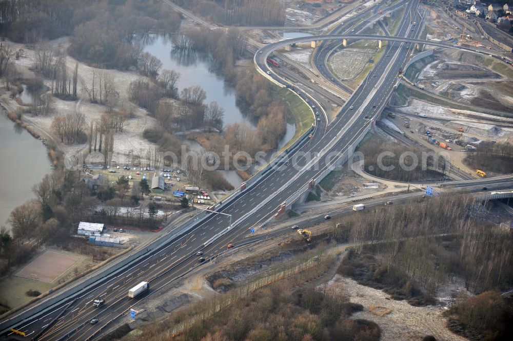 Braunschweig from the bird's eye view: Blick auf den Um- und Ausbau des Autobahndreiecks Braunschweig-Südwest an der Autobahn A29 / A 391. Der EUROVIA Baukonzern errichtet hier einige Brückenneubauten. Bauherr ist die Niedersächsische Landesbehörde für Straßenbau und Verkehr. View of the implementation and expansion of the motorway junction Braunschweig-southwest along the highway A29 / A 395th The construction company built EUROVIA here are some new bridges. Owner is the Lower Saxony state authorities for road construction and transport.