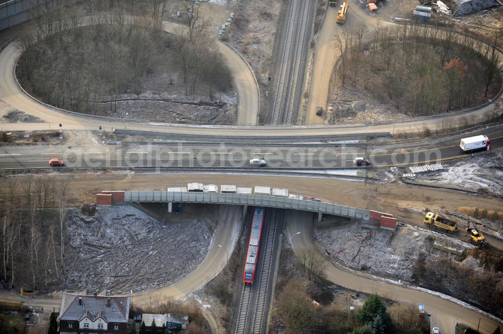 Aerial image Braunschweig - Blick auf den Um- und Ausbau des Autobahndreiecks Braunschweig-Südwest an der Autobahn A29 / A 391. Der EUROVIA Baukonzern errichtet hier einige Brückenneubauten. Bauherr ist die Niedersächsische Landesbehörde für Straßenbau und Verkehr. View of the implementation and expansion of the motorway junction Braunschweig-southwest along the highway A29 / A 395th The construction company built EUROVIA here are some new bridges. Owner is the Lower Saxony state authorities for road construction and transport.