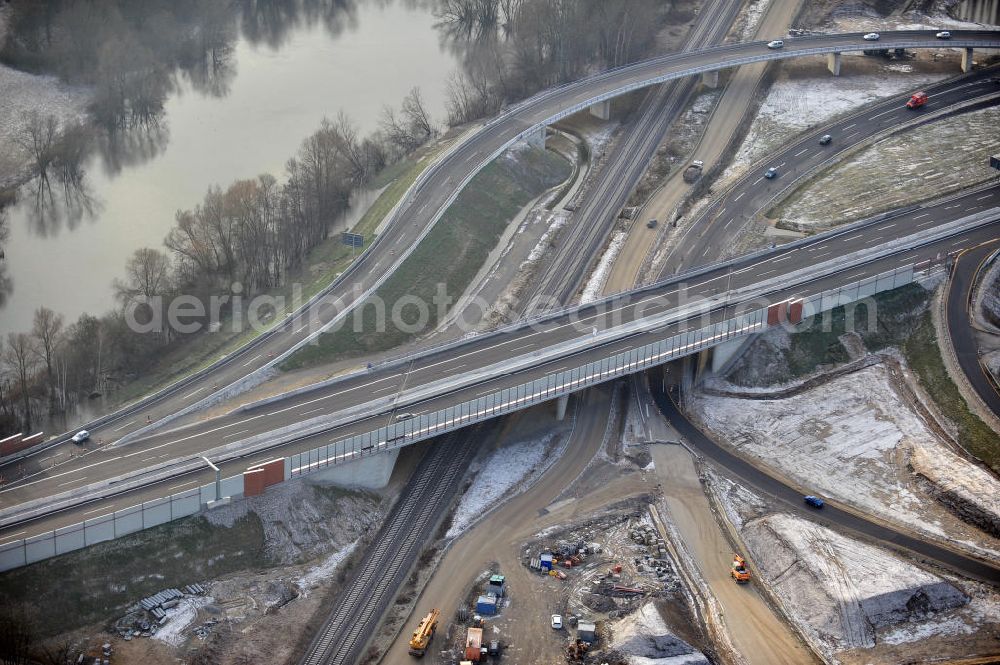 Aerial photograph Braunschweig - Blick auf den Um- und Ausbau des Autobahndreiecks Braunschweig-Südwest an der Autobahn A29 / A 391. Der EUROVIA Baukonzern errichtet hier einige Brückenneubauten. Bauherr ist die Niedersächsische Landesbehörde für Straßenbau und Verkehr. View of the implementation and expansion of the motorway junction Braunschweig-southwest along the highway A29 / A 395th The construction company built EUROVIA here are some new bridges. Owner is the Lower Saxony state authorities for road construction and transport.