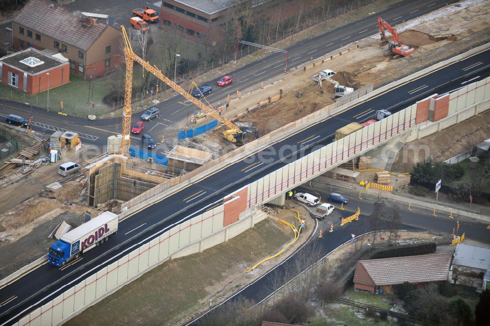 Aerial photograph Braunschweig - Blick auf den Um- und Ausbau des Autobahndreiecks Braunschweig-Südwest an der Autobahn A29 / A 391. Der EUROVIA Baukonzern errichtet hier einige Brückenneubauten. Bauherr ist die Niedersächsische Landesbehörde für Straßenbau und Verkehr. View of the implementation and expansion of the motorway junction Braunschweig-southwest along the highway A29 / A 395th The construction company built EUROVIA here are some new bridges. Owner is the Lower Saxony state authorities for road construction and transport.