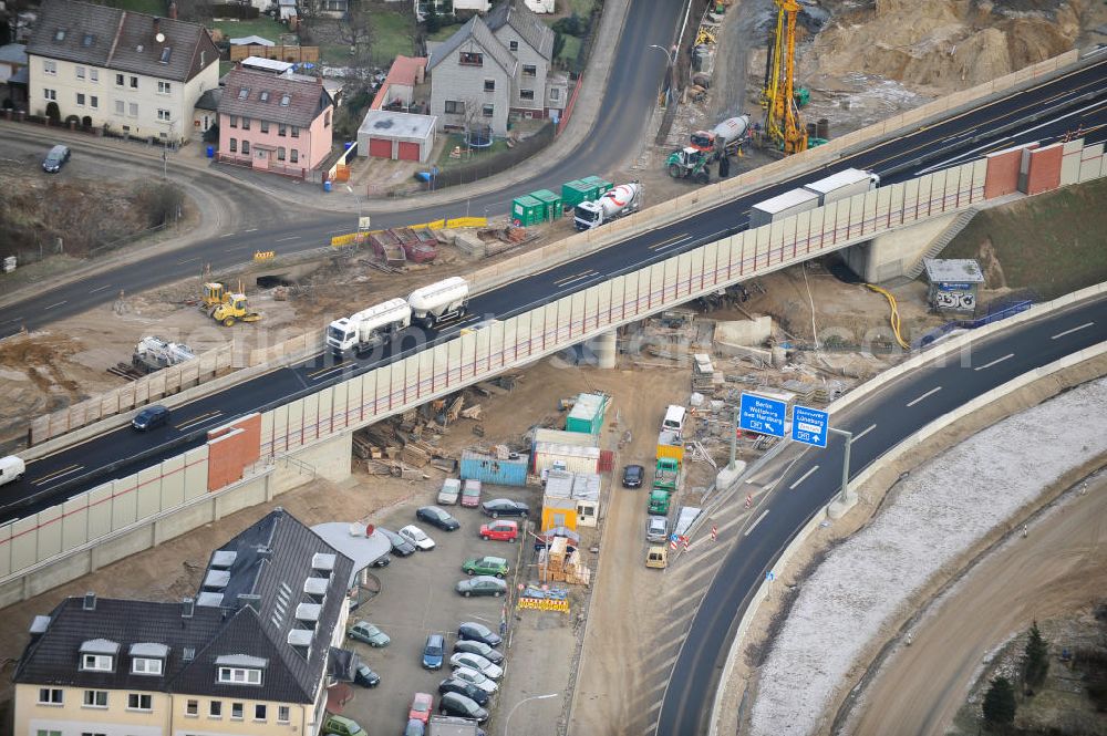 Braunschweig from the bird's eye view: Blick auf den Um- und Ausbau des Autobahndreiecks Braunschweig-Südwest an der Autobahn A29 / A 391. Der EUROVIA Baukonzern errichtet hier einige Brückenneubauten. Bauherr ist die Niedersächsische Landesbehörde für Straßenbau und Verkehr. View of the implementation and expansion of the motorway junction Braunschweig-southwest along the highway A29 / A 395th The construction company built EUROVIA here are some new bridges. Owner is the Lower Saxony state authorities for road construction and transport.