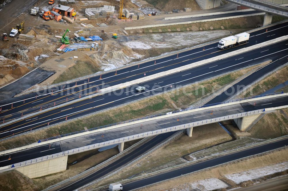 Braunschweig from the bird's eye view: Blick auf den Um- und Ausbau des Autobahndreiecks Braunschweig-Südwest an der Autobahn A29 / A 391. Der EUROVIA Baukonzern errichtet hier einige Brückenneubauten. Bauherr ist die Niedersächsische Landesbehörde für Straßenbau und Verkehr. View of the implementation and expansion of the motorway junction Braunschweig-southwest along the highway A29 / A 395th The construction company built EUROVIA here are some new bridges. Owner is the Lower Saxony state authorities for road construction and transport.