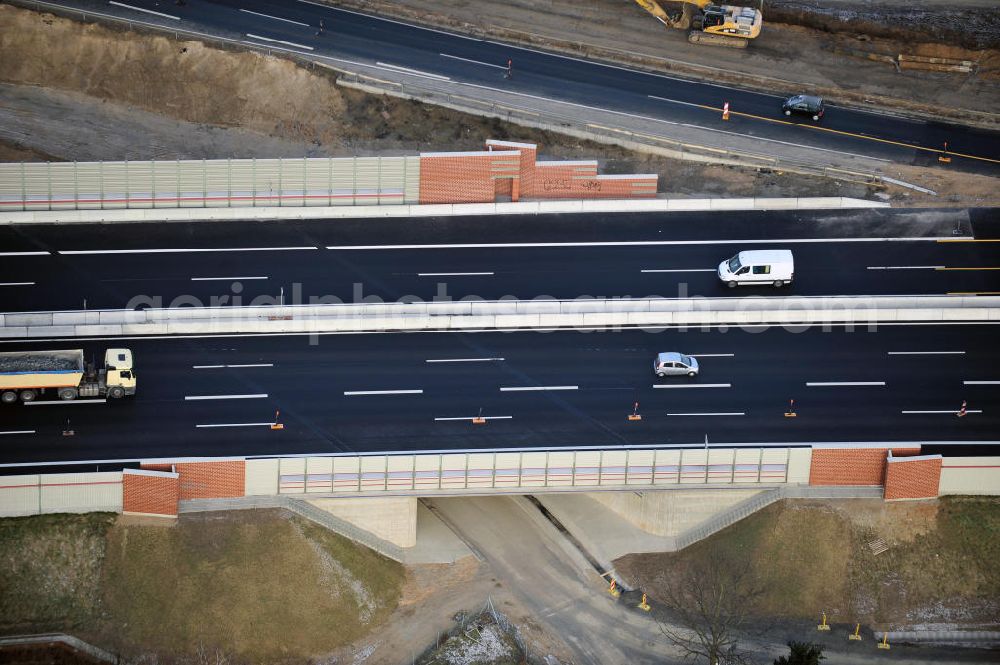 Braunschweig from the bird's eye view: Blick auf den Um- und Ausbau des Autobahndreiecks Braunschweig-Südwest an der Autobahn A29 / A 391. Der EUROVIA Baukonzern errichtet hier einige Brückenneubauten. Bauherr ist die Niedersächsische Landesbehörde für Straßenbau und Verkehr. View of the implementation and expansion of the motorway junction Braunschweig-southwest along the highway A29 / A 395th The construction company built EUROVIA here are some new bridges. Owner is the Lower Saxony state authorities for road construction and transport.