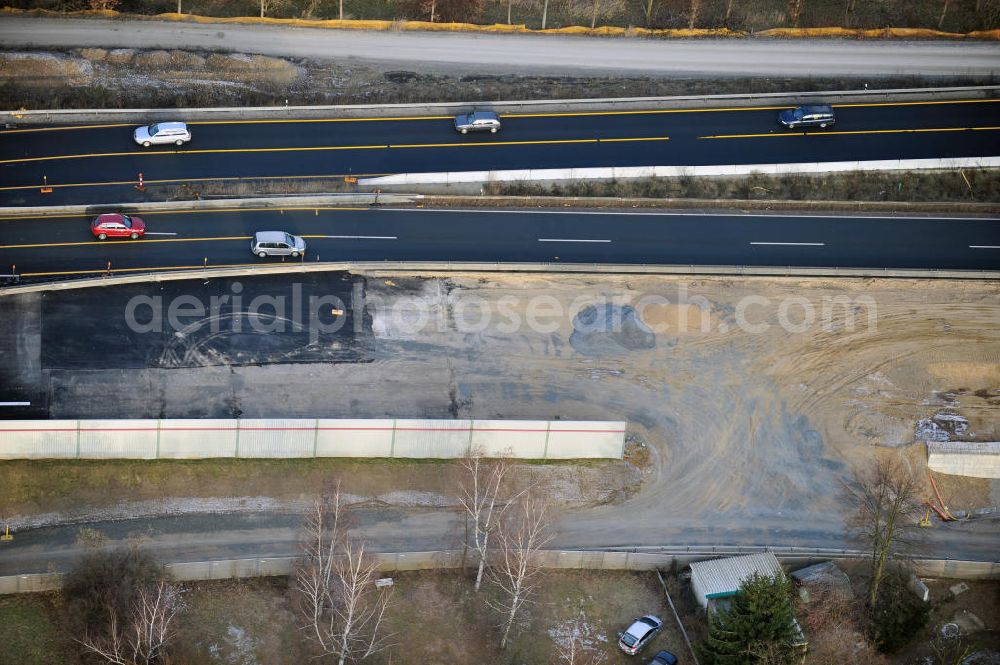 Braunschweig from the bird's eye view: Blick auf den Um- und Ausbau des Autobahndreiecks Braunschweig-Südwest an der Autobahn A29 / A 391. Der EUROVIA Baukonzern errichtet hier einige Brückenneubauten. Bauherr ist die Niedersächsische Landesbehörde für Straßenbau und Verkehr. View of the implementation and expansion of the motorway junction Braunschweig-southwest along the highway A29 / A 395th The construction company built EUROVIA here are some new bridges. Owner is the Lower Saxony state authorities for road construction and transport.