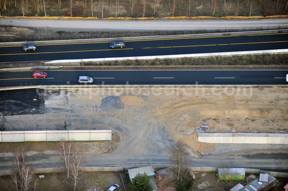 Aerial image Braunschweig - Blick auf den Um- und Ausbau des Autobahndreiecks Braunschweig-Südwest an der Autobahn A29 / A 391. Der EUROVIA Baukonzern errichtet hier einige Brückenneubauten. Bauherr ist die Niedersächsische Landesbehörde für Straßenbau und Verkehr. View of the implementation and expansion of the motorway junction Braunschweig-southwest along the highway A29 / A 395th The construction company built EUROVIA here are some new bridges. Owner is the Lower Saxony state authorities for road construction and transport.