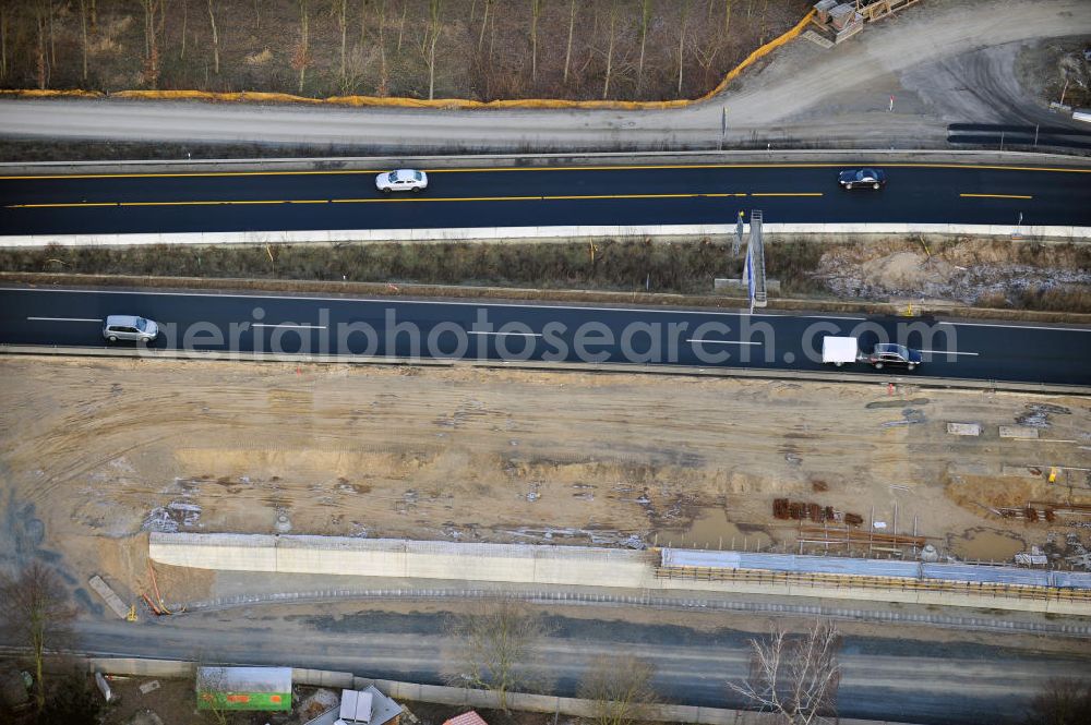 Aerial photograph Braunschweig - Blick auf den Um- und Ausbau des Autobahndreiecks Braunschweig-Südwest an der Autobahn A29 / A 391. Der EUROVIA Baukonzern errichtet hier einige Brückenneubauten. Bauherr ist die Niedersächsische Landesbehörde für Straßenbau und Verkehr. View of the implementation and expansion of the motorway junction Braunschweig-southwest along the highway A29 / A 395th The construction company built EUROVIA here are some new bridges. Owner is the Lower Saxony state authorities for road construction and transport.