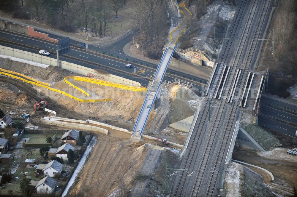 Braunschweig from the bird's eye view: Blick auf den Um- und Ausbau des Autobahndreiecks Braunschweig-Südwest an der Autobahn A29 / A 391. Der EUROVIA Baukonzern errichtet hier einige Brückenneubauten. Bauherr ist die Niedersächsische Landesbehörde für Straßenbau und Verkehr. View of the implementation and expansion of the motorway junction Braunschweig-southwest along the highway A29 / A 395th The construction company built EUROVIA here are some new bridges. Owner is the Lower Saxony state authorities for road construction and transport.