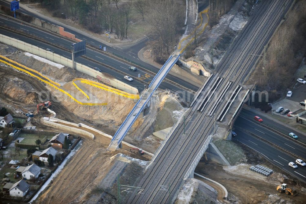 Aerial image Braunschweig - Blick auf den Um- und Ausbau des Autobahndreiecks Braunschweig-Südwest an der Autobahn A29 / A 391. Der EUROVIA Baukonzern errichtet hier einige Brückenneubauten. Bauherr ist die Niedersächsische Landesbehörde für Straßenbau und Verkehr. View of the implementation and expansion of the motorway junction Braunschweig-southwest along the highway A29 / A 395th The construction company built EUROVIA here are some new bridges. Owner is the Lower Saxony state authorities for road construction and transport.