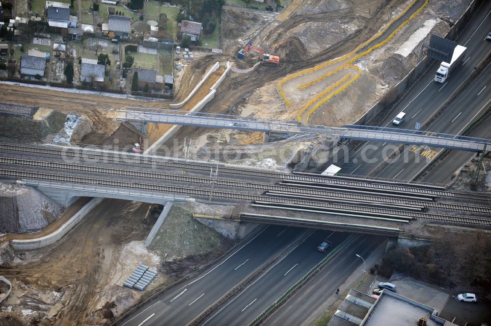 Aerial image Braunschweig - Blick auf den Um- und Ausbau des Autobahndreiecks Braunschweig-Südwest an der Autobahn A29 / A 391. Der EUROVIA Baukonzern errichtet hier einige Brückenneubauten. Bauherr ist die Niedersächsische Landesbehörde für Straßenbau und Verkehr. View of the implementation and expansion of the motorway junction Braunschweig-southwest along the highway A29 / A 395th The construction company built EUROVIA here are some new bridges. Owner is the Lower Saxony state authorities for road construction and transport.