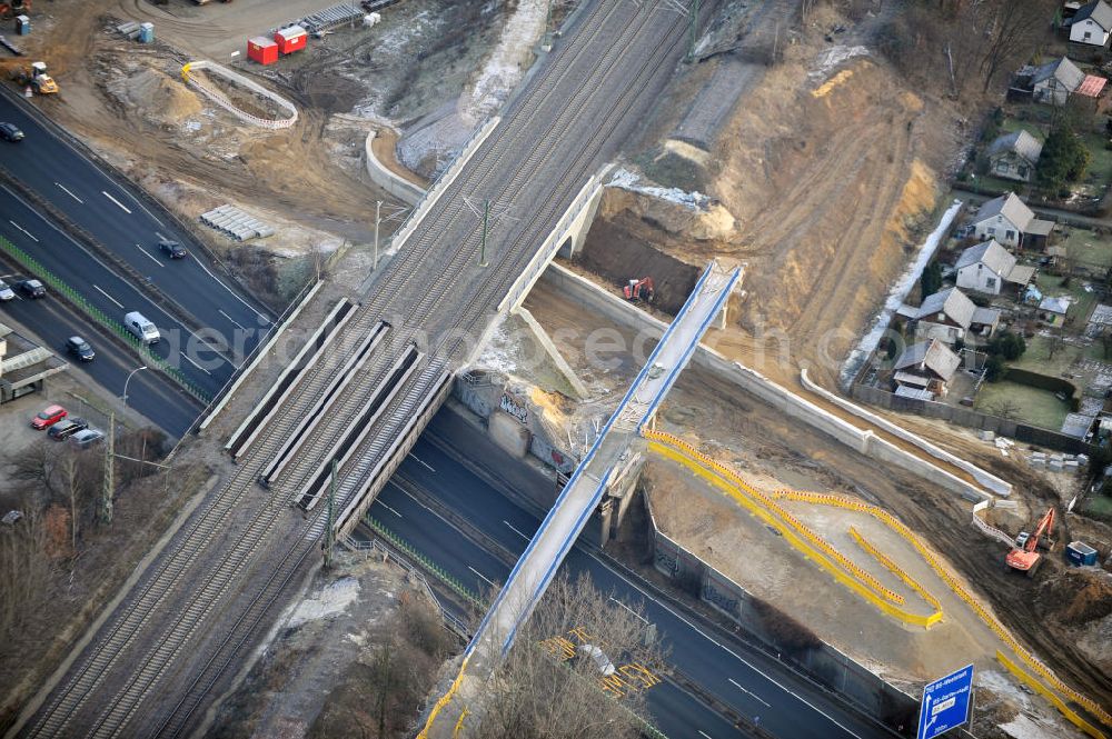 Braunschweig from the bird's eye view: Blick auf den Um- und Ausbau des Autobahndreiecks Braunschweig-Südwest an der Autobahn A29 / A 391. Der EUROVIA Baukonzern errichtet hier einige Brückenneubauten. Bauherr ist die Niedersächsische Landesbehörde für Straßenbau und Verkehr. View of the implementation and expansion of the motorway junction Braunschweig-southwest along the highway A29 / A 395th The construction company built EUROVIA here are some new bridges. Owner is the Lower Saxony state authorities for road construction and transport.