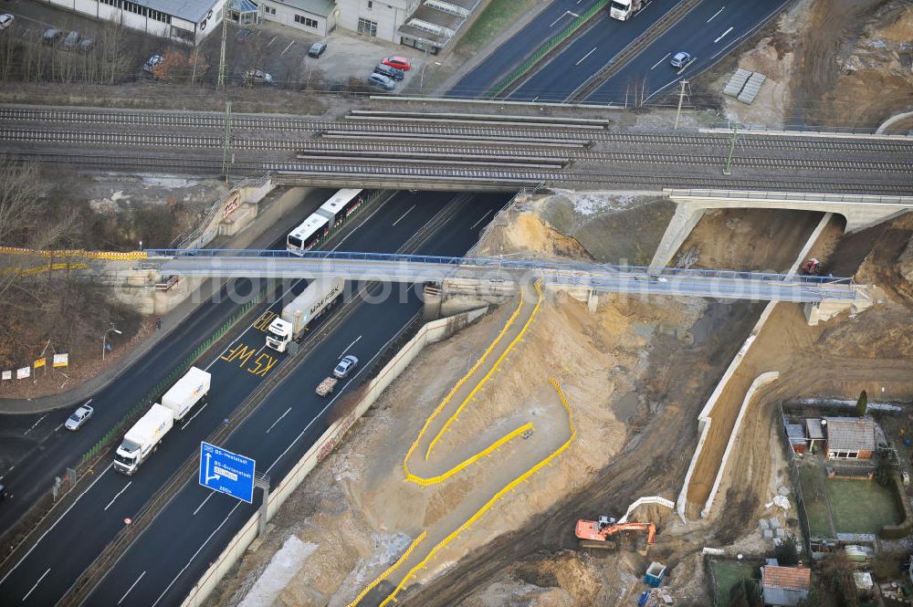 Aerial photograph Braunschweig - Blick auf den Um- und Ausbau des Autobahndreiecks Braunschweig-Südwest an der Autobahn A29 / A 391. Der EUROVIA Baukonzern errichtet hier einige Brückenneubauten. Bauherr ist die Niedersächsische Landesbehörde für Straßenbau und Verkehr. View of the implementation and expansion of the motorway junction Braunschweig-southwest along the highway A29 / A 395th The construction company built EUROVIA here are some new bridges. Owner is the Lower Saxony state authorities for road construction and transport.