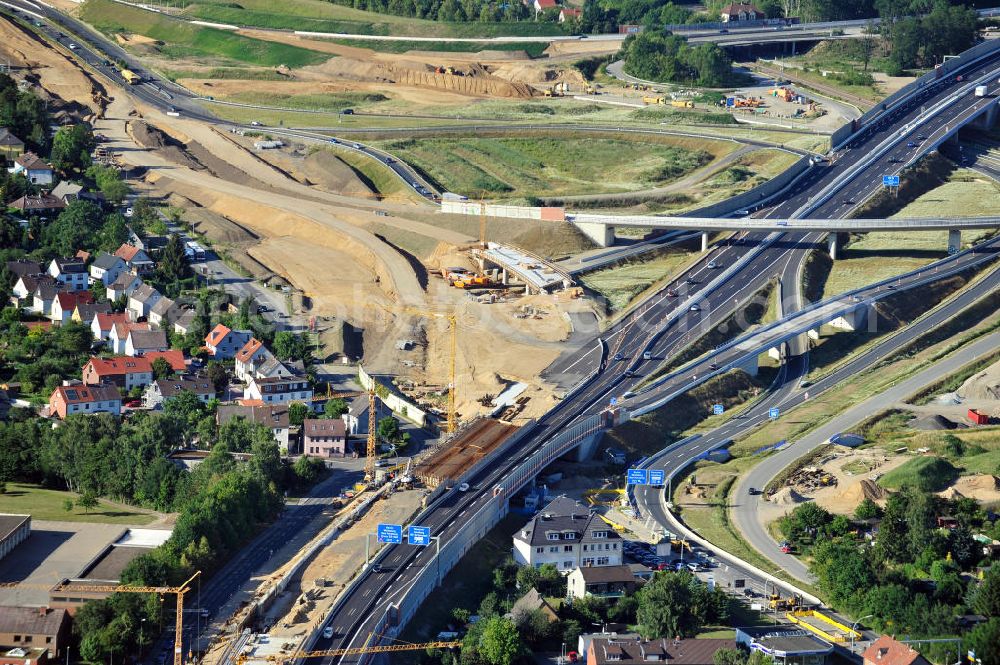 Aerial image Braunschweig - Blick auf den Um- und Ausbau des Autobahndreiecks Braunschweig-Südwest an der Autobahn A29 / A 391 in Niedersachsen. Der EUROVIA Baukonzern errichtet hier einige Brückenneubauten. Bauherr ist die Niedersächsische Landesbehörde für Straßenbau und Verkehr. View of the implementation and expansion of the motorway junction Brunswick-southwest along the freeway A29 / A 395 in Lower Saxony. The construction company EUROVIA built here are some new bridges. Owner is the Lower Saxony state authorities for road construction and transport.