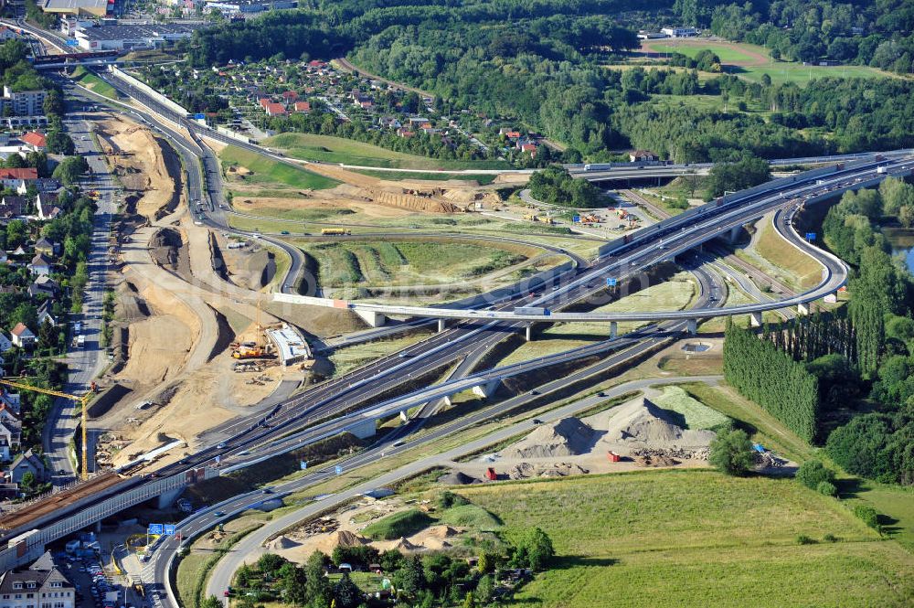 Braunschweig from the bird's eye view: Blick auf den Um- und Ausbau des Autobahndreiecks Braunschweig-Südwest an der Autobahn A29 / A 391 in Niedersachsen. Der EUROVIA Baukonzern errichtet hier einige Brückenneubauten. Bauherr ist die Niedersächsische Landesbehörde für Straßenbau und Verkehr. View of the implementation and expansion of the motorway junction Brunswick-southwest along the freeway A29 / A 395 in Lower Saxony. The construction company EUROVIA built here are some new bridges. Owner is the Lower Saxony state authorities for road construction and transport.