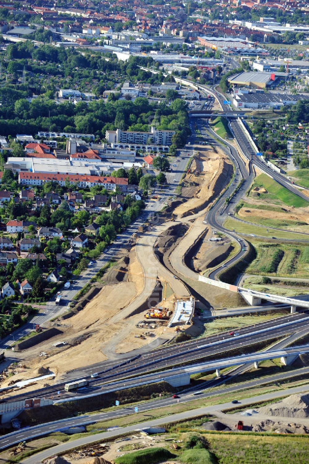 Braunschweig from above - Blick auf den Um- und Ausbau des Autobahndreiecks Braunschweig-Südwest an der Autobahn A29 / A 391 in Niedersachsen. Der EUROVIA Baukonzern errichtet hier einige Brückenneubauten. Bauherr ist die Niedersächsische Landesbehörde für Straßenbau und Verkehr. View of the implementation and expansion of the motorway junction Brunswick-southwest along the freeway A29 / A 395 in Lower Saxony. The construction company EUROVIA built here are some new bridges. Owner is the Lower Saxony state authorities for road construction and transport.