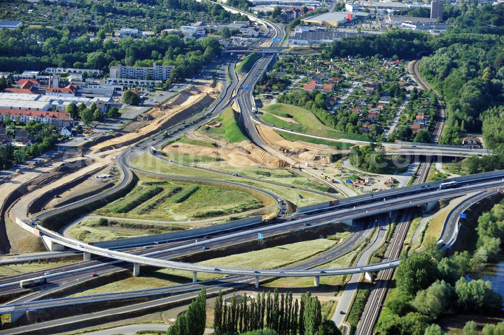 Braunschweig from above - Blick auf den Um- und Ausbau des Autobahndreiecks Braunschweig-Südwest an der Autobahn A29 / A 391 in Niedersachsen. Der EUROVIA Baukonzern errichtet hier einige Brückenneubauten. Bauherr ist die Niedersächsische Landesbehörde für Straßenbau und Verkehr. View of the implementation and expansion of the motorway junction Brunswick-southwest along the freeway A29 / A 395 in Lower Saxony. The construction company EUROVIA built here are some new bridges. Owner is the Lower Saxony state authorities for road construction and transport.