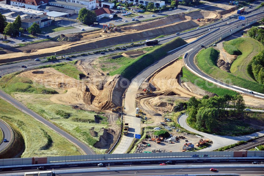 Braunschweig from above - Blick auf den Um- und Ausbau des Autobahndreiecks Braunschweig-Südwest an der Autobahn A29 / A 391 in Niedersachsen. Der EUROVIA Baukonzern errichtet hier einige Brückenneubauten. Bauherr ist die Niedersächsische Landesbehörde für Straßenbau und Verkehr. View of the implementation and expansion of the motorway junction Brunswick-southwest along the freeway A29 / A 395 in Lower Saxony. The construction company EUROVIA built here are some new bridges. Owner is the Lower Saxony state authorities for road construction and transport.