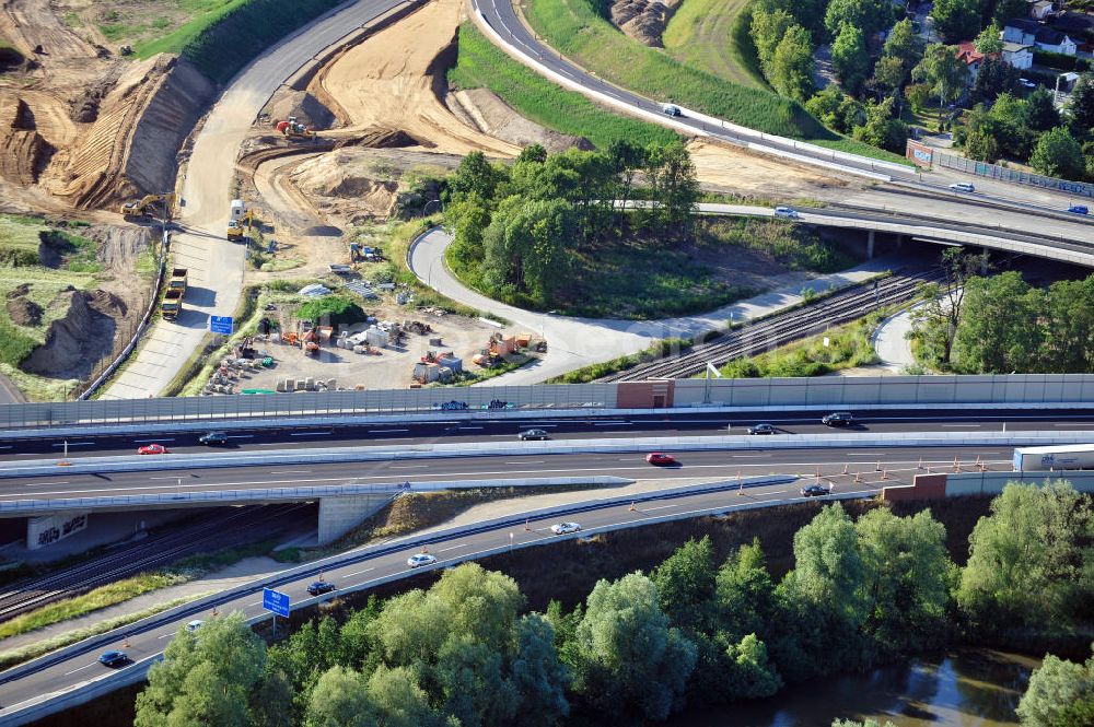 Braunschweig from the bird's eye view: Blick auf den Um- und Ausbau des Autobahndreiecks Braunschweig-Südwest an der Autobahn A29 / A 391 in Niedersachsen. Der EUROVIA Baukonzern errichtet hier einige Brückenneubauten. Bauherr ist die Niedersächsische Landesbehörde für Straßenbau und Verkehr. View of the implementation and expansion of the motorway junction Brunswick-southwest along the freeway A29 / A 395 in Lower Saxony. The construction company EUROVIA built here are some new bridges. Owner is the Lower Saxony state authorities for road construction and transport.